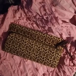 Zippered faux animal print clutch NWOT.